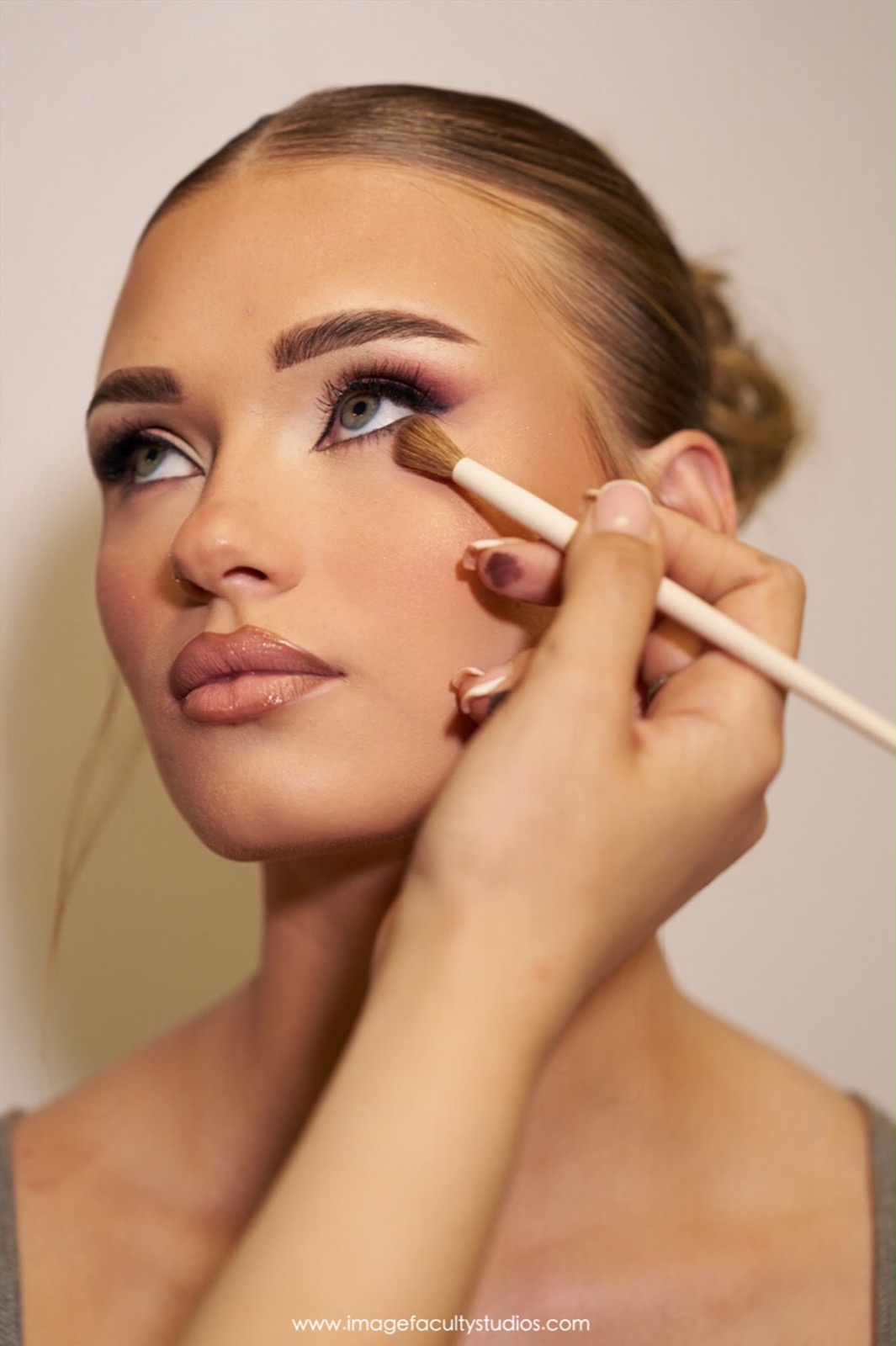 Behind the scenes — blending shadow with a brush mid-application
