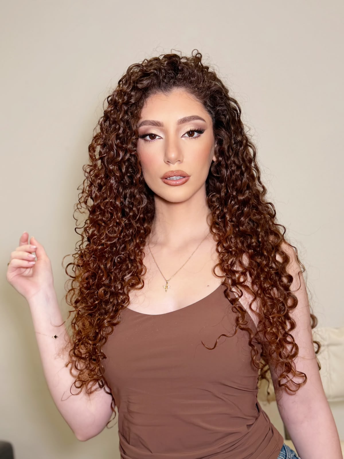 Long spiral curls with glowing bronzed skin