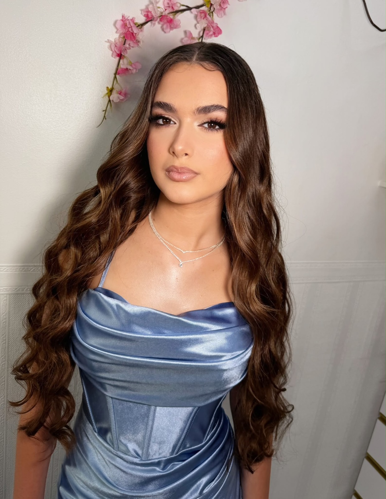 Blue satin corset gown with long barrel curls